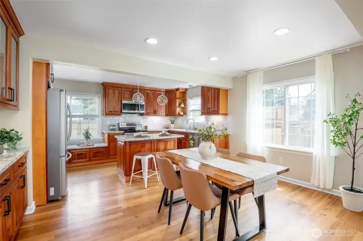 It is easy to picture a group of friends gathering in this space- moving easily between the kitchen and dining room.