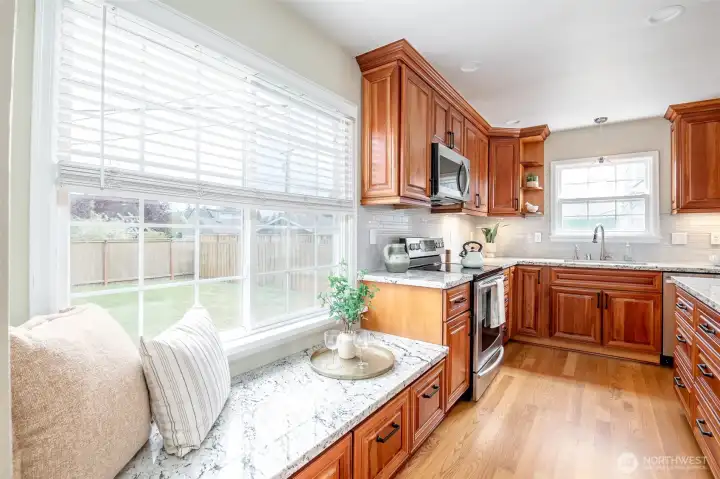 This pretty window seat looks over the sweet backyard - perfect to perch with your morning coffee.
