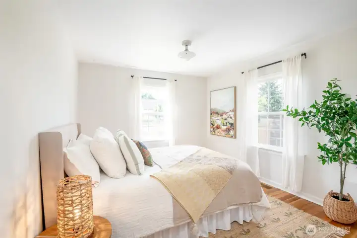 The front bedroom feels airy and bright.