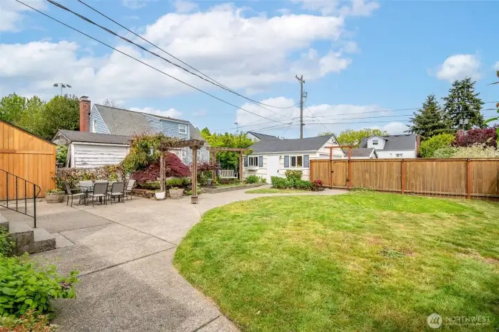 Enjoy the multiple spaces for entertaining, gardening, or play.
