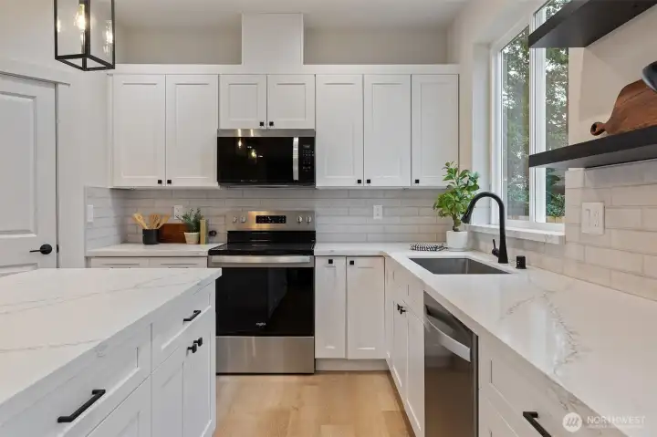 Tile backsplash in kitchen.