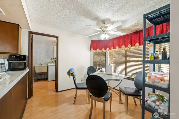 eating area off kitchen with large windows for natural light eating area off kitchen with large windows for natural light