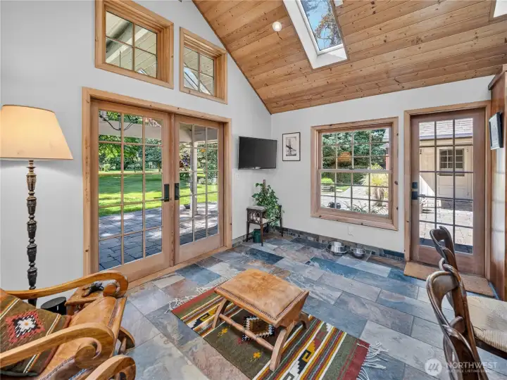 Vaulted Great Room room with heated & polished concrete floor.
