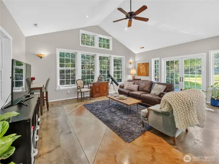 Detached ALU living room with vaulted ceilings.