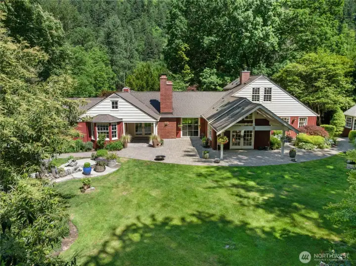 Beautiful back patio overlooking the perfectly manicured grounds.
