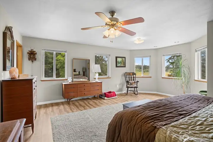 Large primary bedroom with lovely views, creating a peaceful retreat to start and end your day. Large primary bedroom with lovely views, creating a peaceful retreat to start and end your day.
