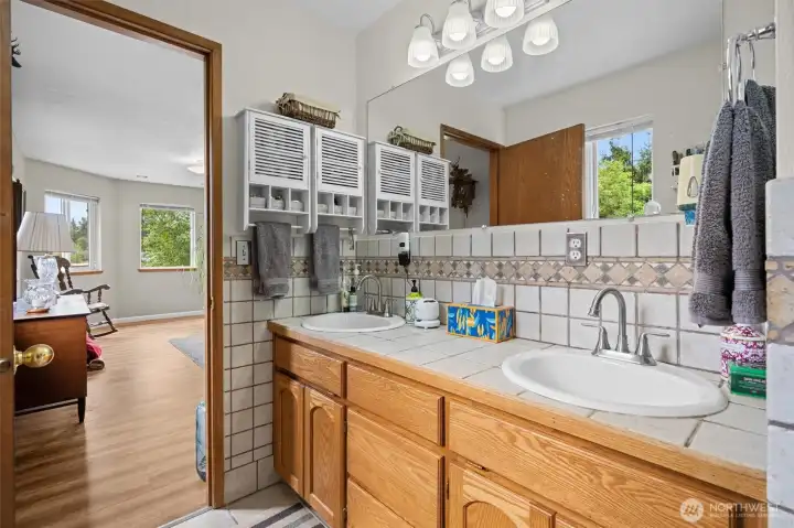 A large 5 piece primary bathroom that makes every morning feel special. A large 5 piece primary bathroom that makes every morning feel special.