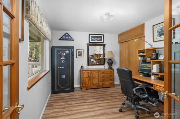 Flexible main-level room perfect as a home office, guest bedroom, or whatever best fits your lifestyle. Flexible main-level room perfect as a home office, guest bedroom, or whatever best fits your lifestyle.