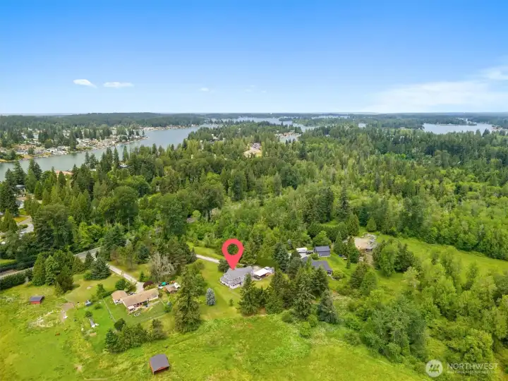 Private acreage in a desirable Bonney Lake location, just minutes from Lake Tapps and surrounded by beautiful natural scenery. Private acreage in a desirable Bonney Lake location, just minutes from Lake Tapps and surrounded by beautiful natural scenery.