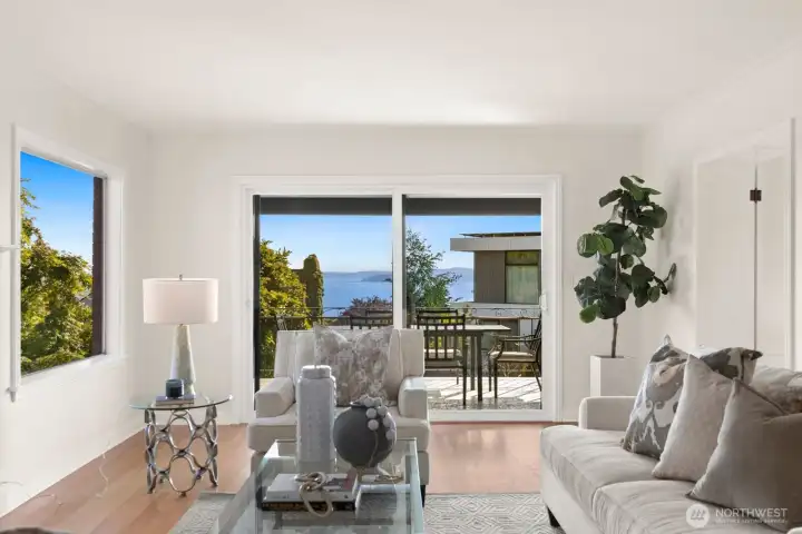 Beautiful views of the Puget Sound from large newly installed sliding doors that lead to a large deck. Beautiful views of the Puget Sound from large newly installed sliding doors that lead to a large deck.