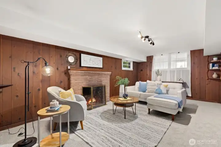 Rec room downstairs with fireplace. Rec room downstairs with fireplace.