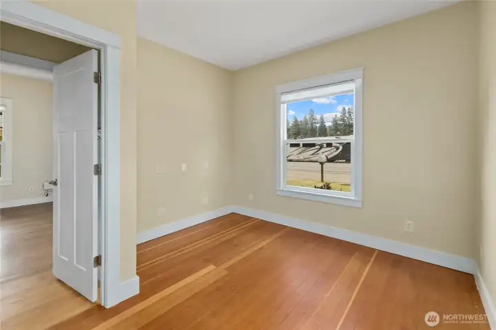 Bedroom 1. This main floor bedroom is perfect for guests, family, or a dedicated workspace. Bedroom 1. This main floor bedroom is perfect for guests, family, or a dedicated workspace.