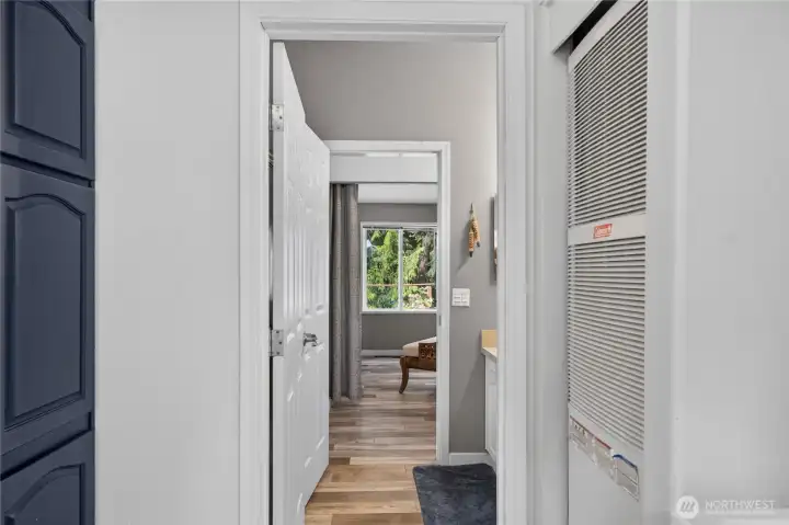 Looking through doors from utility room and bath. Looking through doors from utility room and bath.