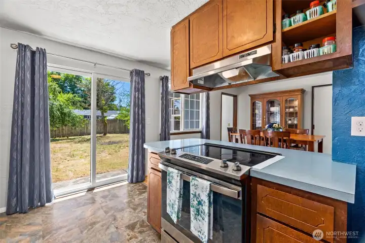 Sliding glass doors to the backyard Sliding glass doors to the backyard