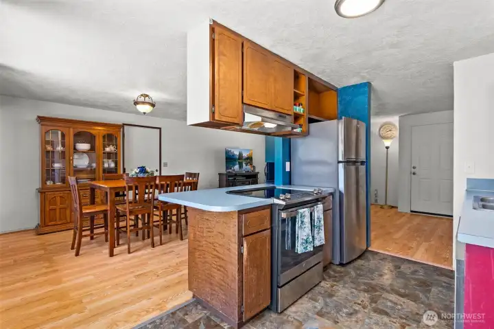 Kitchen looks into dining room Kitchen looks into dining room