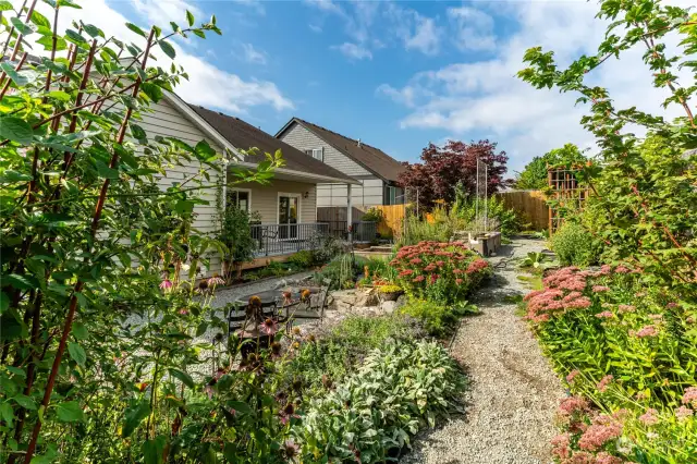 Mature gardens with many native plants, perennials, low water use garden design designed to be pollinator friendly with blooms from February to late fall. Plus a upper faucet for the hose connection for easy watering.