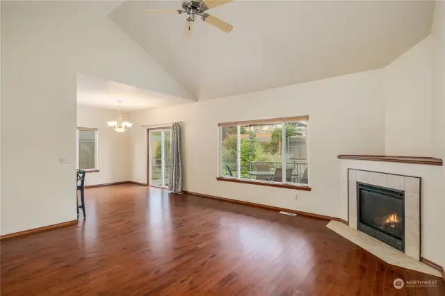 Hardwood floors, beautiful fireplace with wide wood top, tile accent and EZ to turn on fireplace.