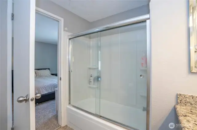 The primary bath includes a convenient tub/shower combination—perfect for both quick rinses and relaxing soaks.