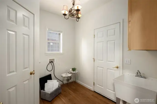 Generous size walk-in pantry, laundry room with laundry sink
