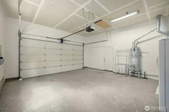 Extra tall two car garage with stair access loft for extra storage