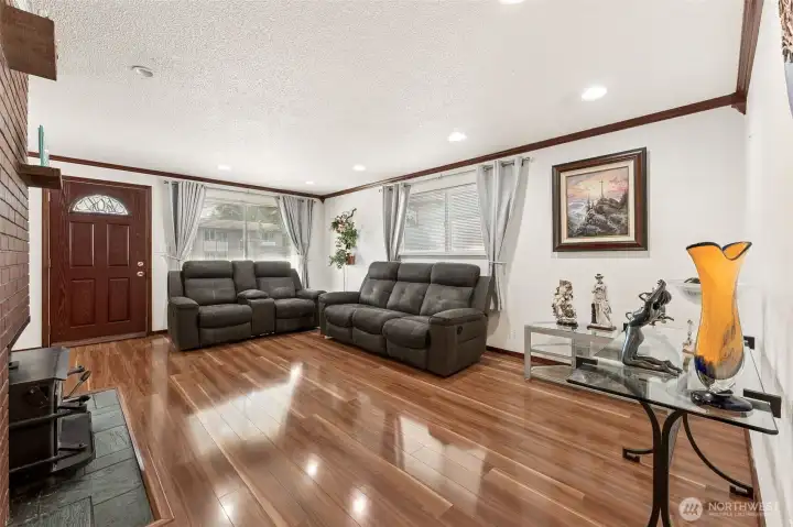 Living Room with Woodstove & Brazilian Fruitwood Floors