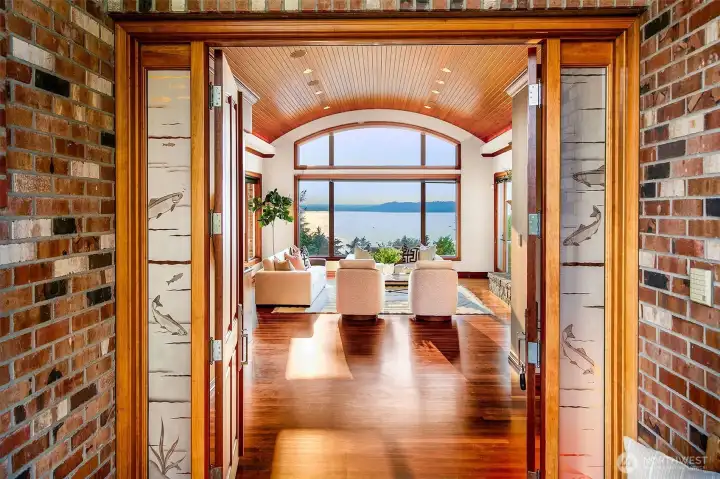 Etched glass and formal entry way welcomes you to this sceanic and special home.
