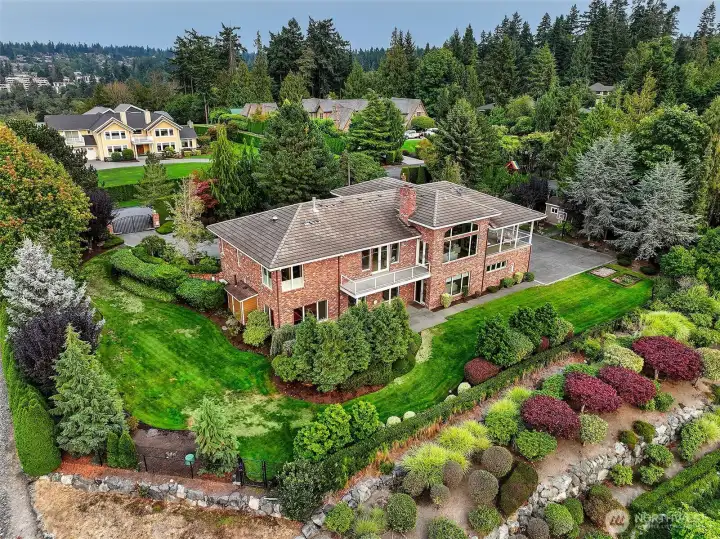 Mature landscaping and set up high to take in all the view