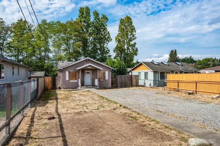 House situated well back in the lot. Some interesting development opportunities here.