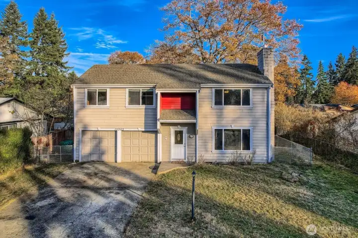 Solid home, ready for your personal touch. Grassy & level front yard surrounded by tall hedges. Hardie plank siding, wood wrapped vinyl windows and a partially covered entry.