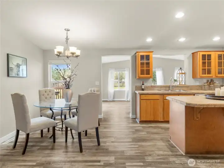 kitchen and dining lead to bonus room