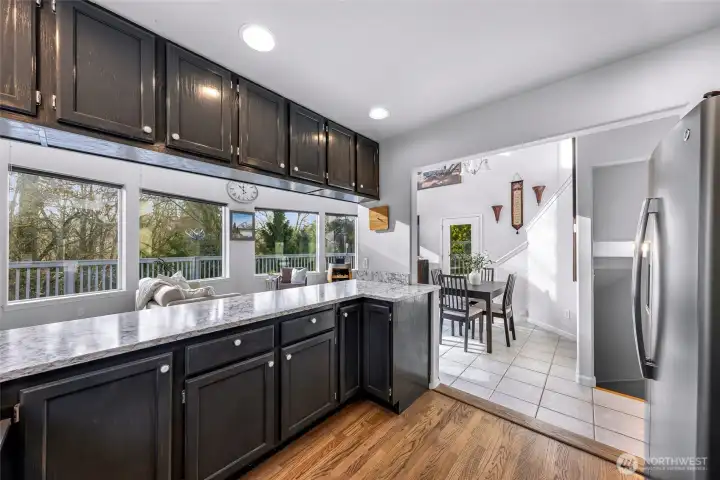Kitchen is located in the heart of the home, open and connected to all the living and dining spaces.
