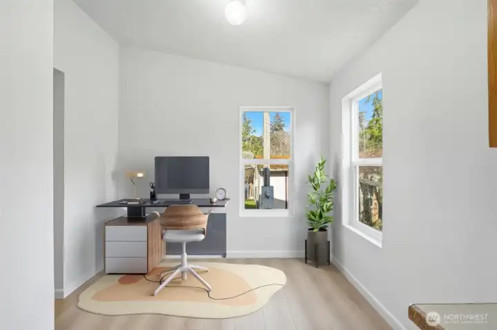 Virtually staged nook showcasing a versatile space ideal for a home office or study.