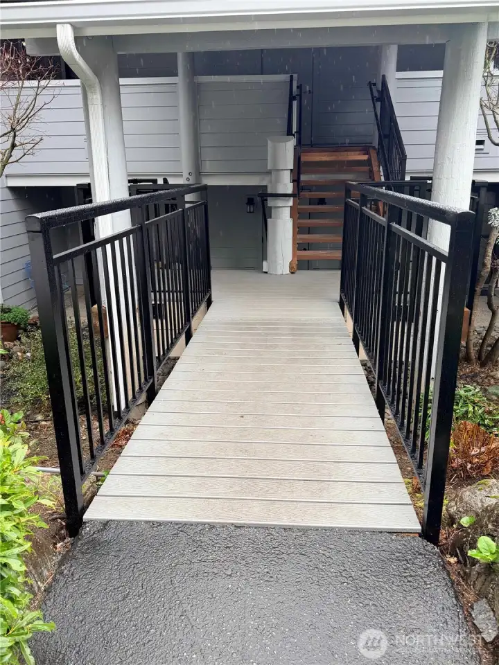 This is what the new entry will look like. New iron trails and composite decking coming SOON!