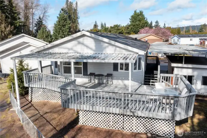 Spacious deck offers river vistas, soaring eagles, and blossoming trees; a perfect spot for morning coffee.