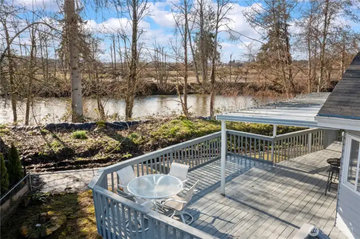 Enjoy true riverfront living! This home remained high and dry during this year’s historic flooding, offering peace of mind while you relax and take in the tranquil waterfront views.