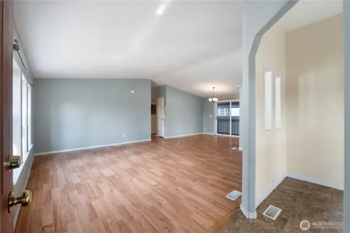 Bright and comfortable living room with plenty of natural light and a welcoming atmosphere.