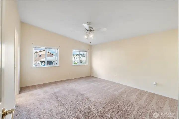 Comfortable primary bedroom offering a peaceful retreat at the end of the day.