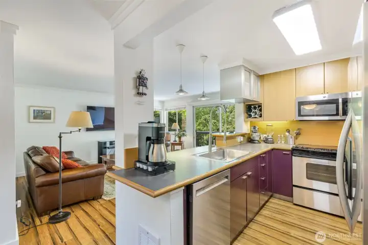 Hallway to sleeping area and bathroom to the right