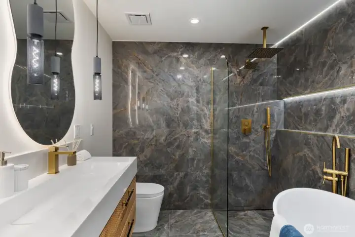 Additional full size bathroom upstairs with 72inch bathtub and heated floors