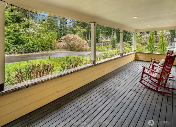 Large covered porch allows for quite reading time, or to enjoy your morning coffee/tea