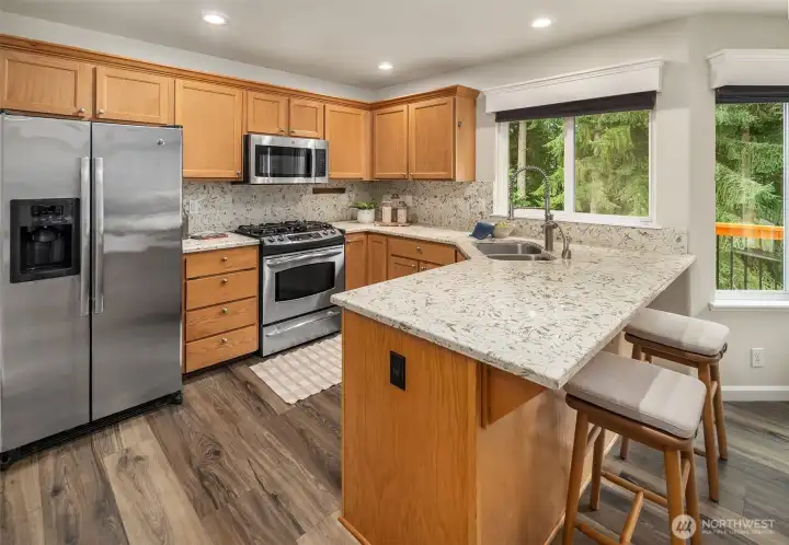 Tastefully updated kitchen with quartz countertops.