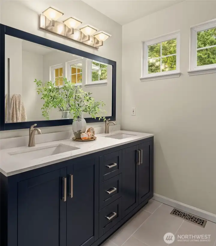 Newly updated primary suite bathroom with new quartz vanity!