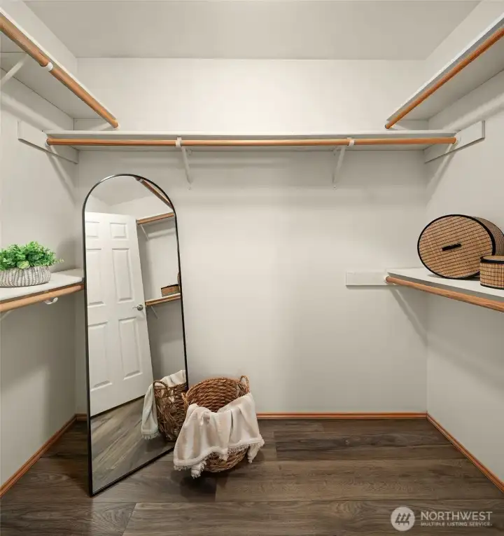 Primary walk-in-closet.