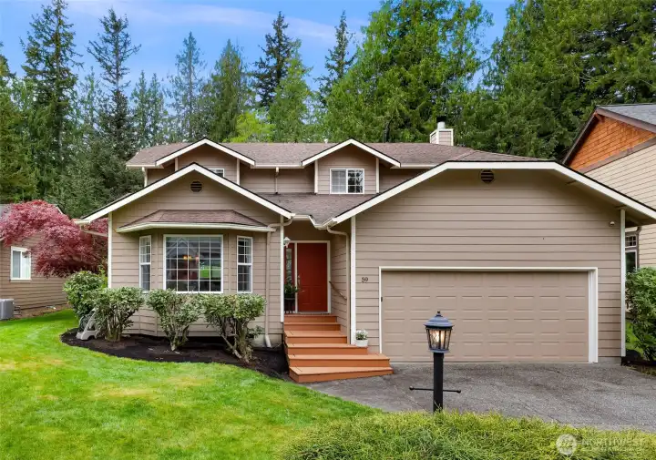 Welcome to 59 Windward Drive, backing the 13th Fairway!