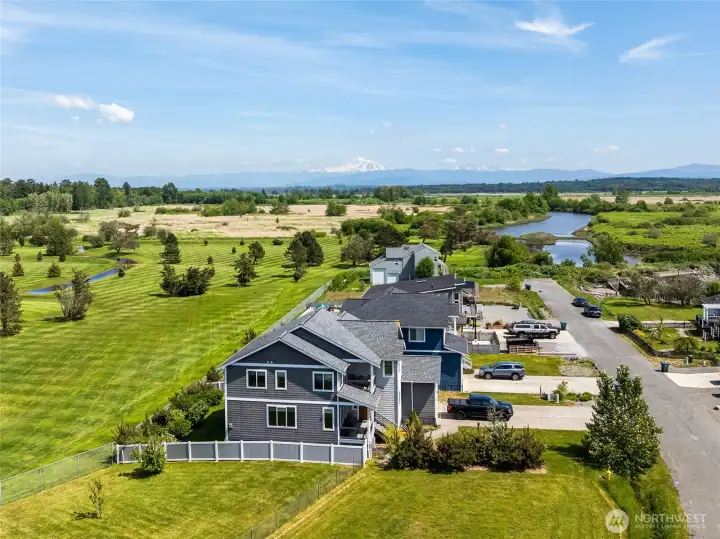 Nestled between the golf course and the bay, this lovely neighborhood of newer homes enjoys spectacular views of Mt Baker! Nestled between the golf course and the bay, this lovely neighborhood of newer homes enjoys spectacular views of Mt Baker!
