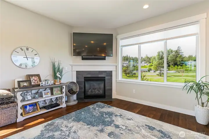 Cozy fireplace and big picture windows! Cozy fireplace and big picture windows!