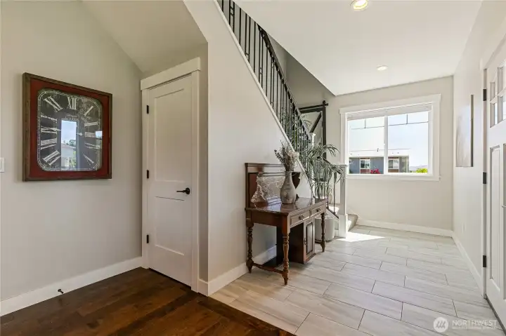 Inviting entryway is light and bright, is adjacent to the kitchen and dining area. Another storage closet under the stairs. Beautiful staircase railing invites you upstairs. Inviting entryway is light and bright, is adjacent to the kitchen and dining area. Another storage closet under the stairs. Beautiful staircase railing invites you upstairs.