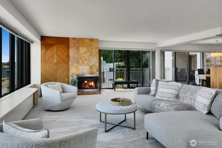 Grand Living Room with Floor to Ceiling Tiled Gas Fireplace