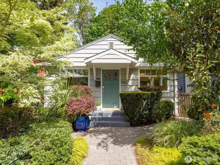 Charming Greenwood bungalow on a residential street.