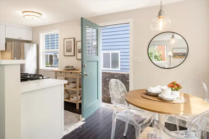 Door in kitchen takes you to the beautiful backyard, fully fenced in front of the door - great for dogs!